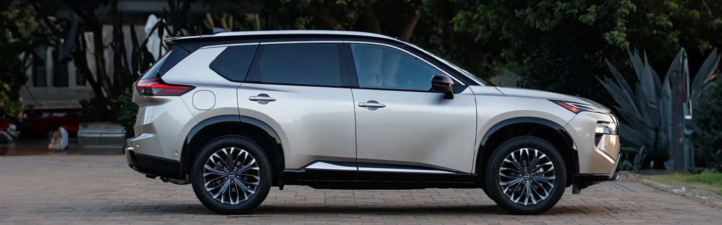 2024 Nissan Rogue Specs side front in silver