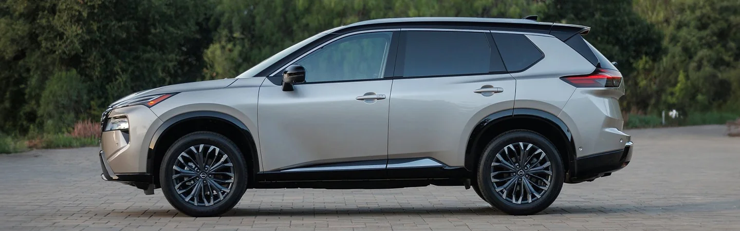 2024 Nissan Rogue Specs side front in silver