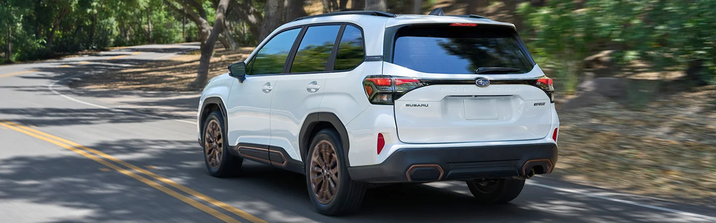 2025 Subaru Forester driving on a country road in Waco, TX