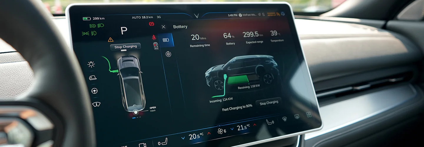 Interior close up view of the dashboard tech of a 2025 VinFast VF 9