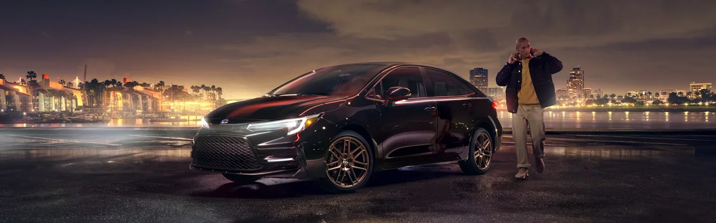 Parked 2024 Toyota Corolla witha city view in the background