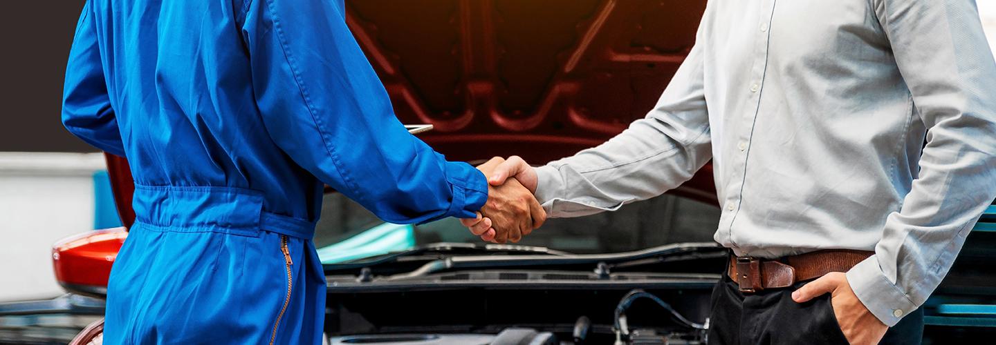 service person shaking hand