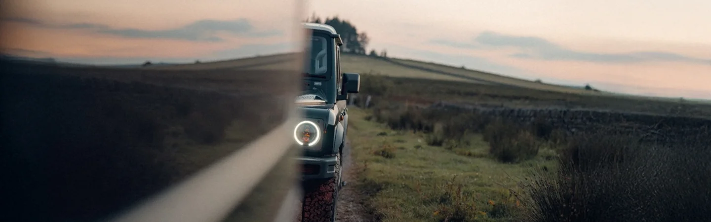 2024 INEOS Grenadier vs Jeep Wrangler black front view