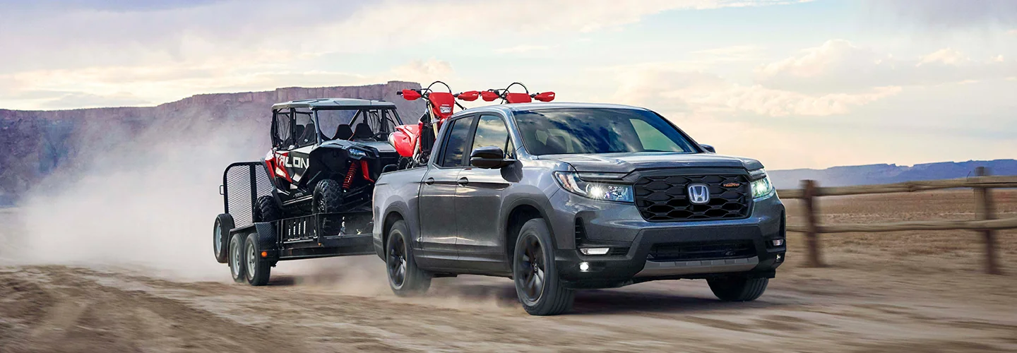 2026 Honda Ridgeline Towing some offroad ATVs