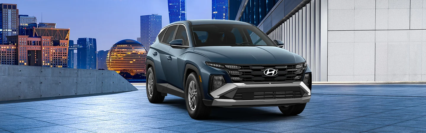 2025 Hyundai Tucson front view blue on parking garage