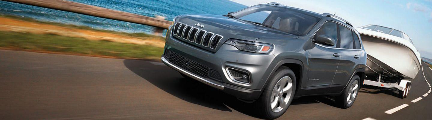 2021 Jeep Cherokee towing a boat
