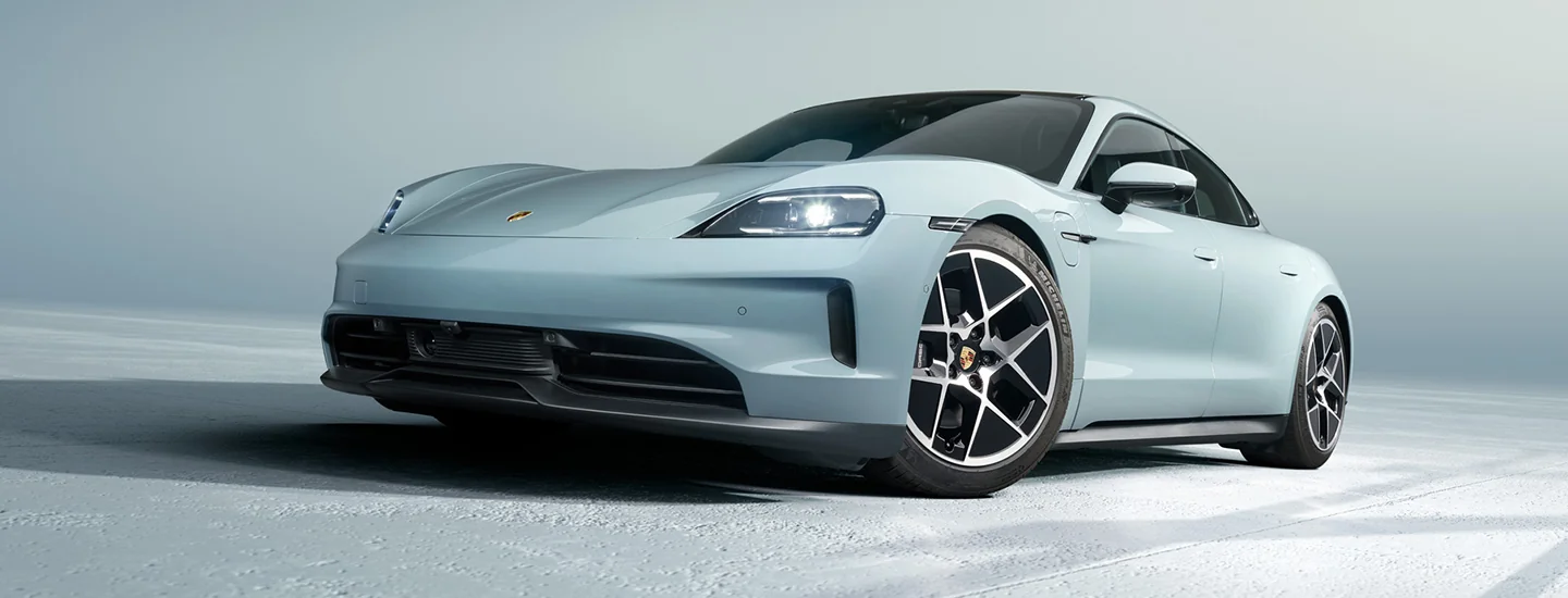 front view of a light blue 2025 Porsche Taycan