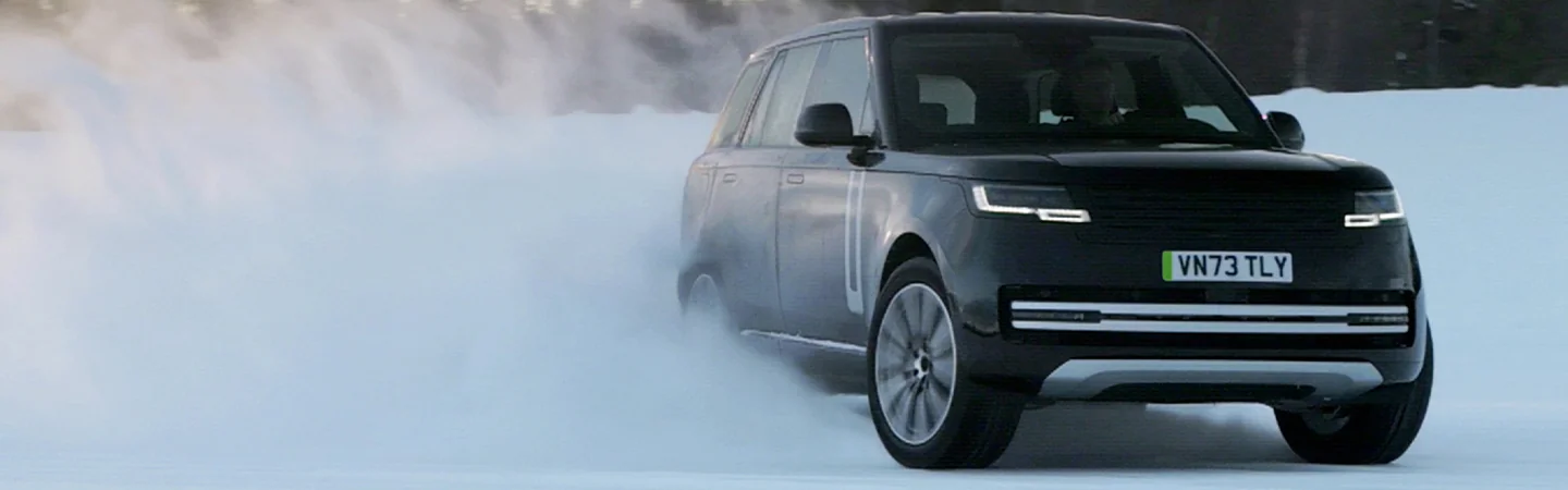 Range Rover Velar driving in snow