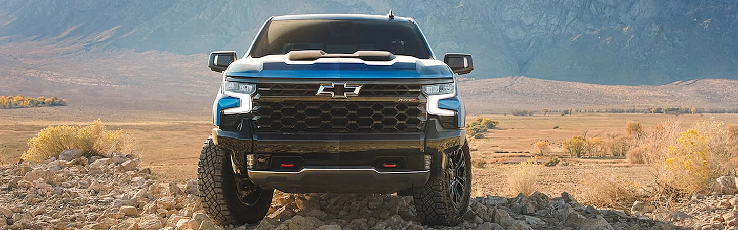 2024 Chevrolet Silverado 1500 front side with blue