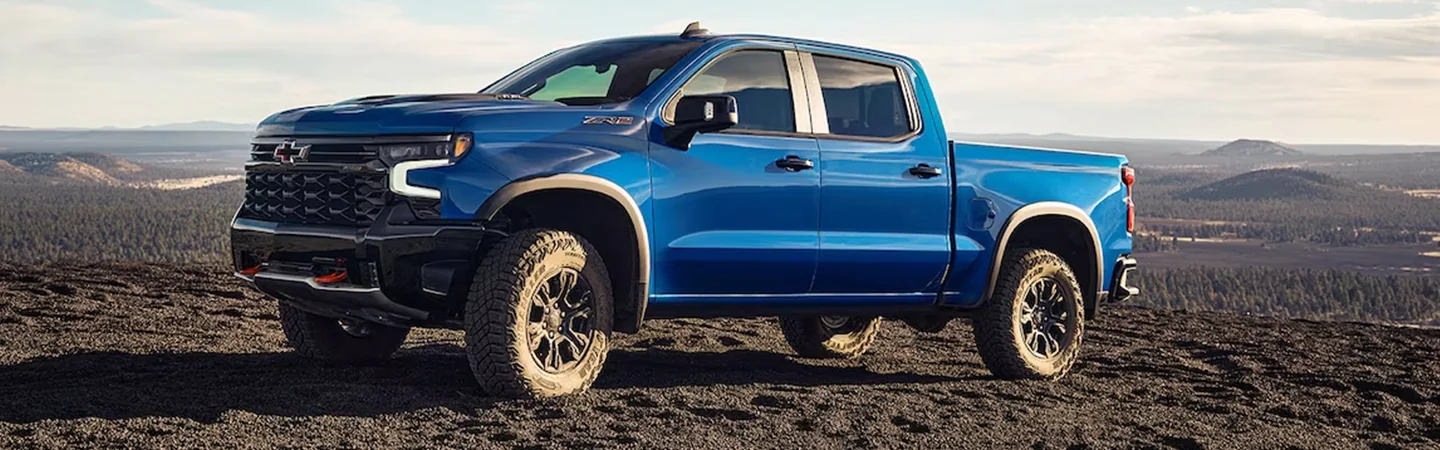 2024 Chevrolet Silverado 1500 front side with blue