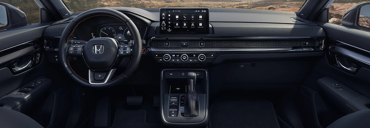 Interior view of the dashboard and tech of a 2026 Honda CR-V Hybrid