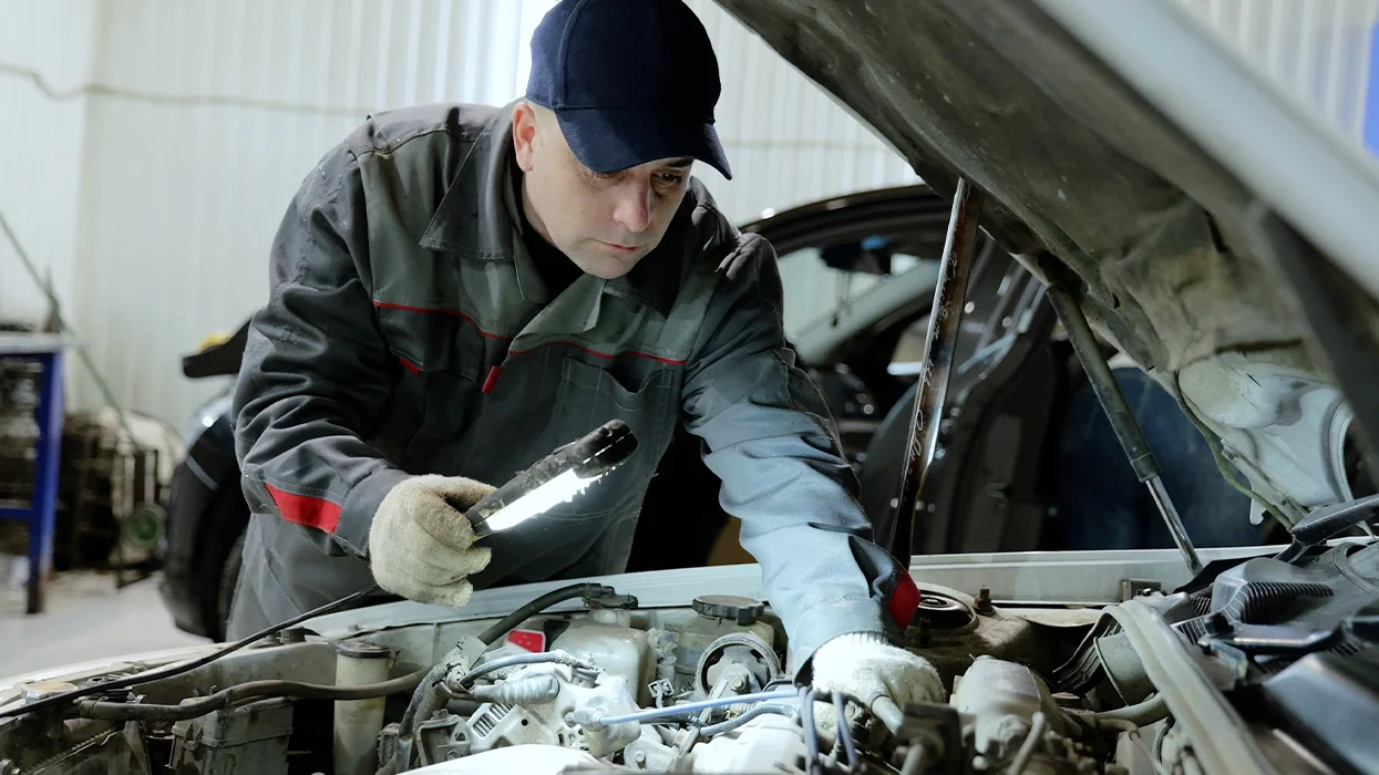 mechanic in engine