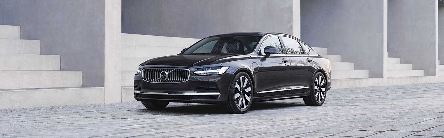 2025 Volvo S90 Specs black color car stand on road