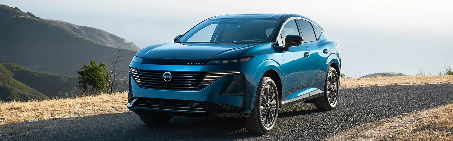 The 2025 Nissan Murano blue color car park on the road