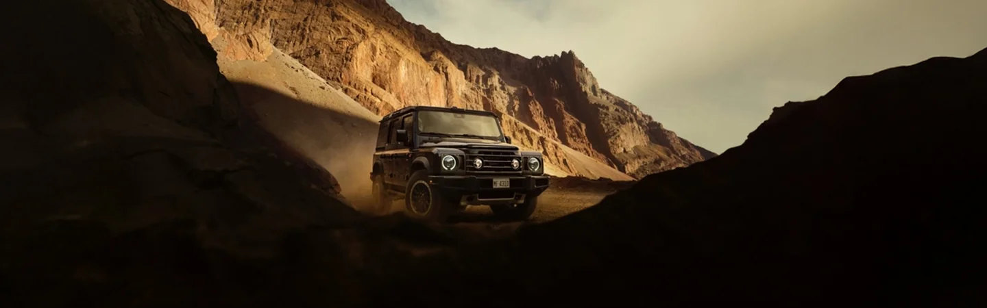 2024 INEOS Grenadier Trialmaster vs Defender color black and front view