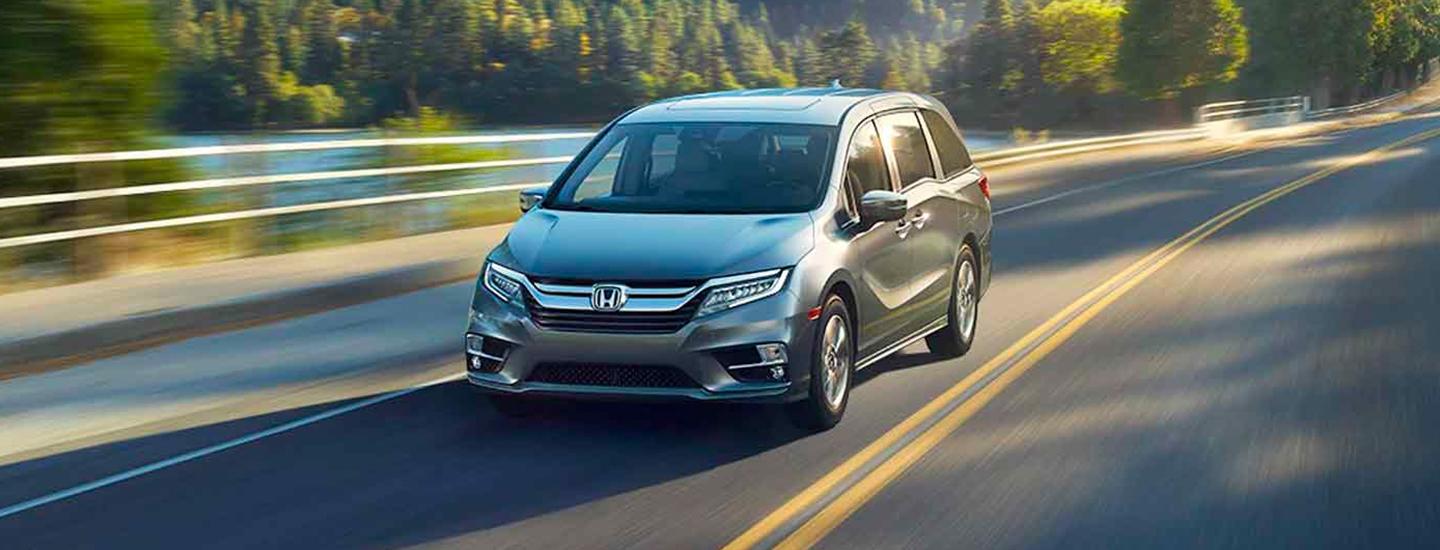 2020 Honda Odyssey in motion near a lake