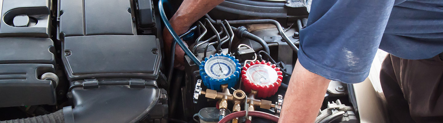 tech working on engine