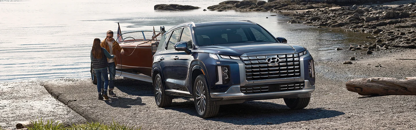 2025 Hyundai Palisade hooking up boat on trailer on ramp