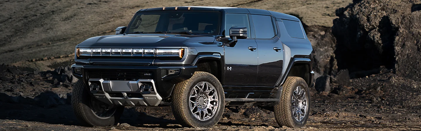 black 2025 GMC HUMMER EV SUV off-road
