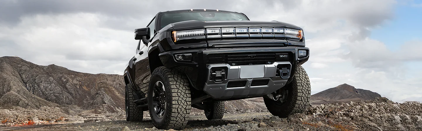 black 2025 GMC HUMMER EV SUV off-road