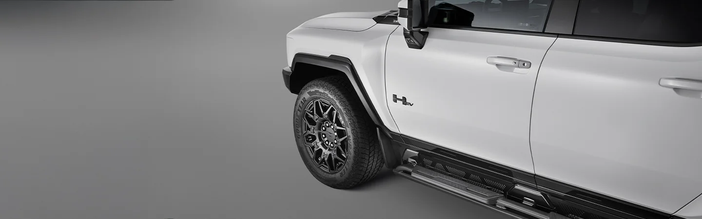 white 2025 GMC HUMMER EV SUV side view