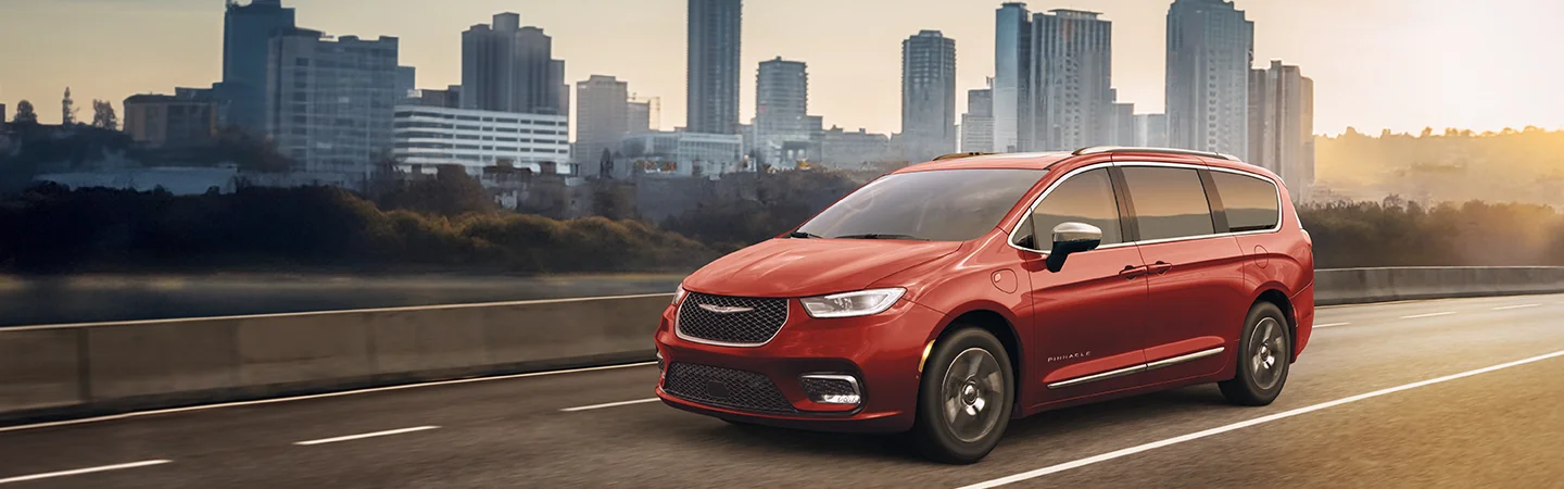 2025 Chrysler Pacifica Plug-In Hybrid Red color car running on road