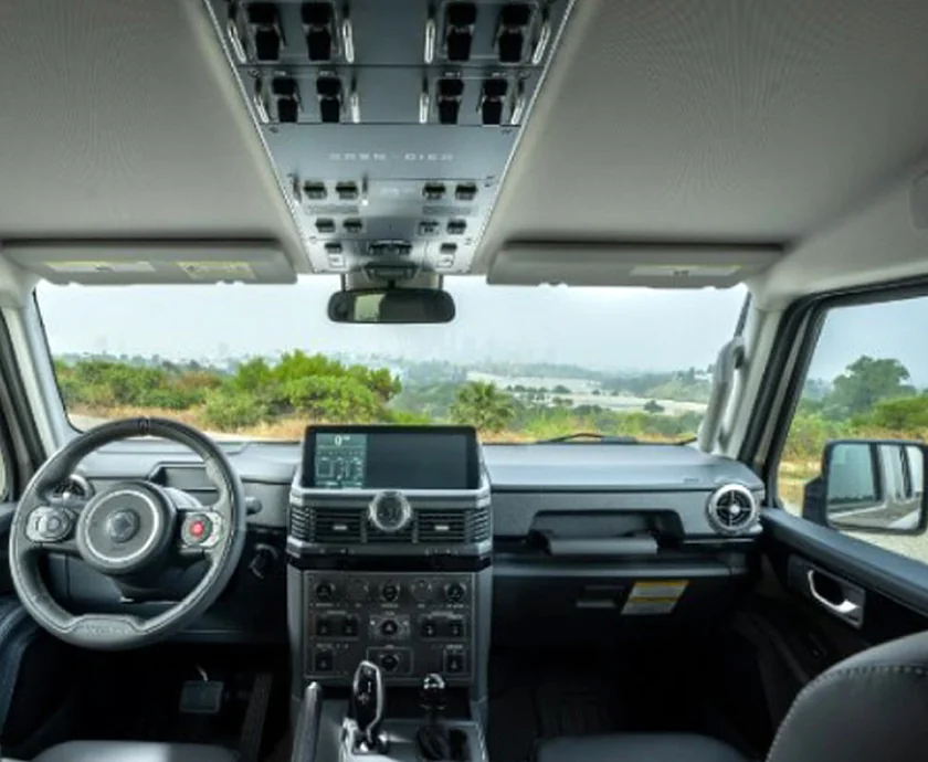 Interor view of the front seat and dashboard of a 2026 INEOS Grenadier Trialmaster