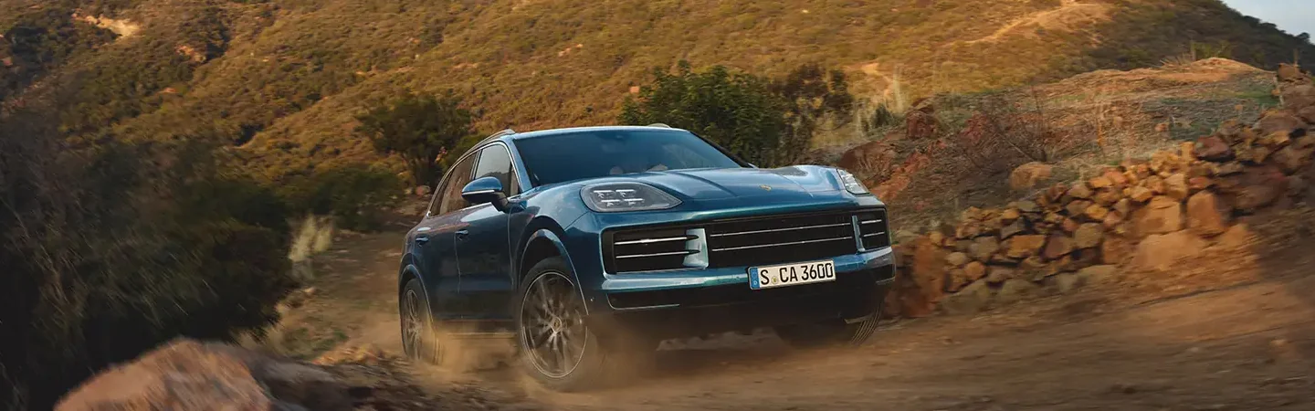 blue 2024 Porsche Cayan offroad
