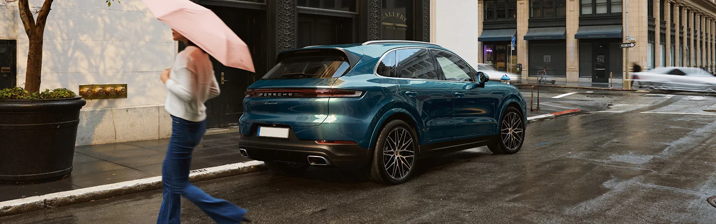 rear view of a 2025 Porsche Cayenne Coupe Base in the rain