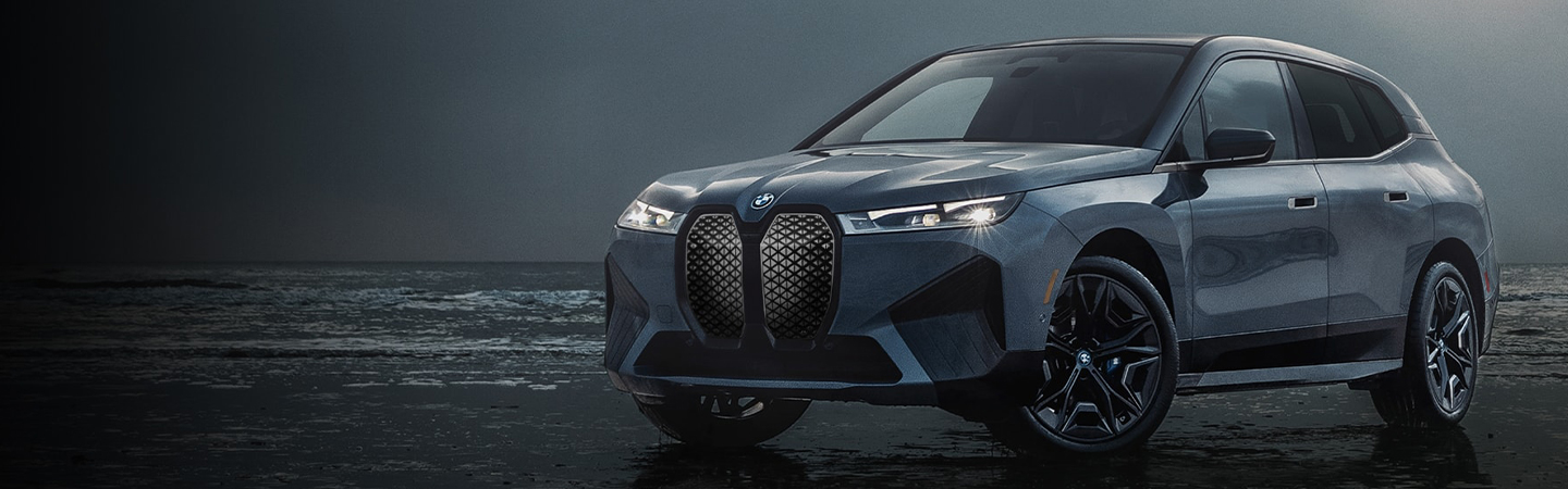 2024 BMW iX Range side front in blue