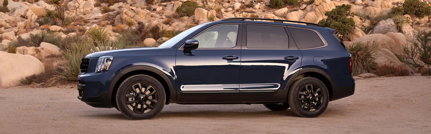2024 Kia EV9 vs Kia Telluride side view purple