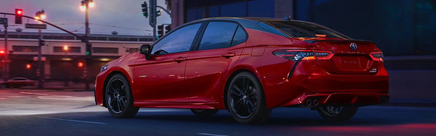 2024 Toyota Camry Hybrid Specs red side view 
