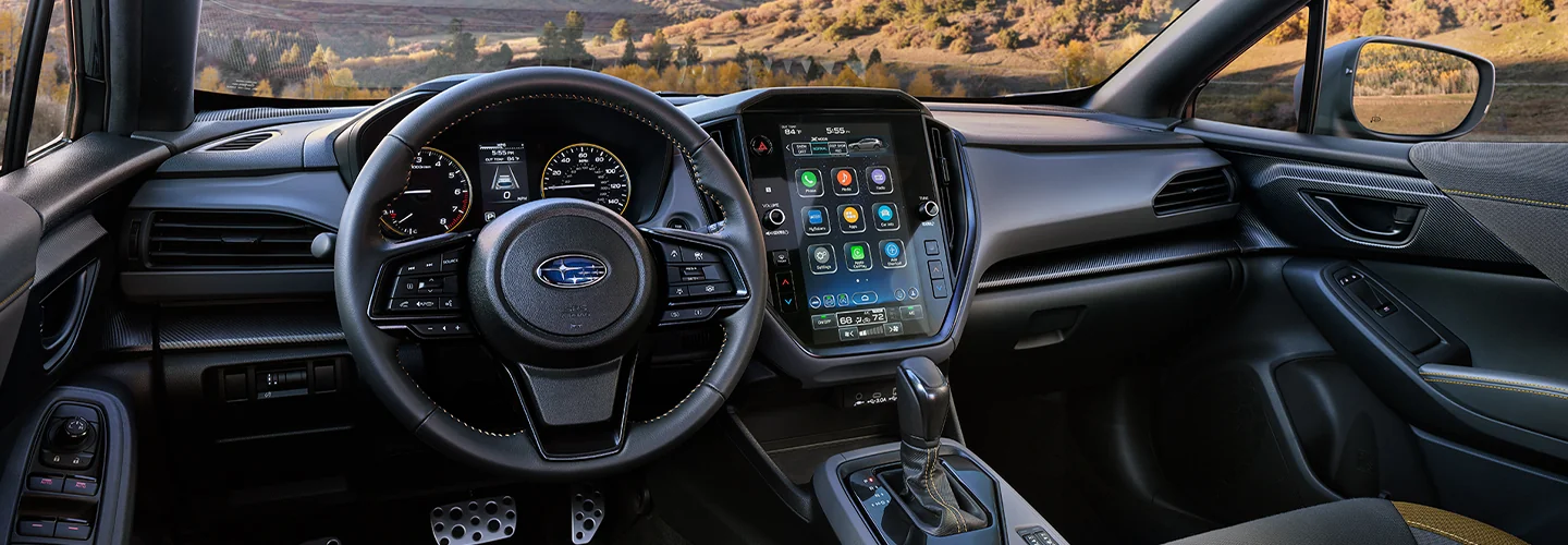 Interiorview of the dashboard and tech of a 2025 Subaru Crosstrek in Nederland, TX.