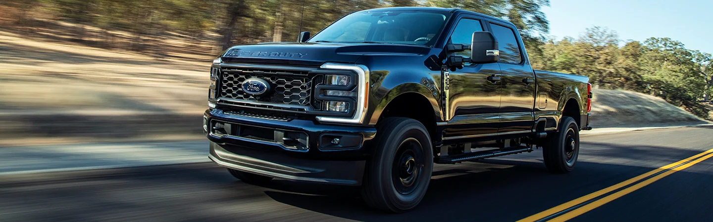 2025 Ford F-250 Super Duty driving on a mountain road