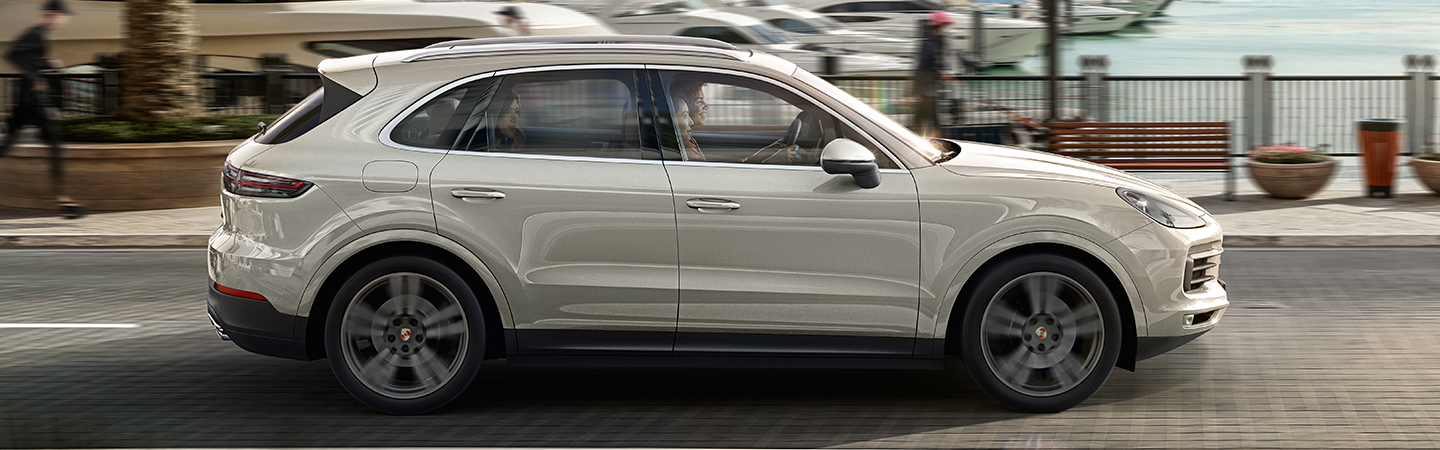 Side view of the 2021 Porsche Cayenne in motion