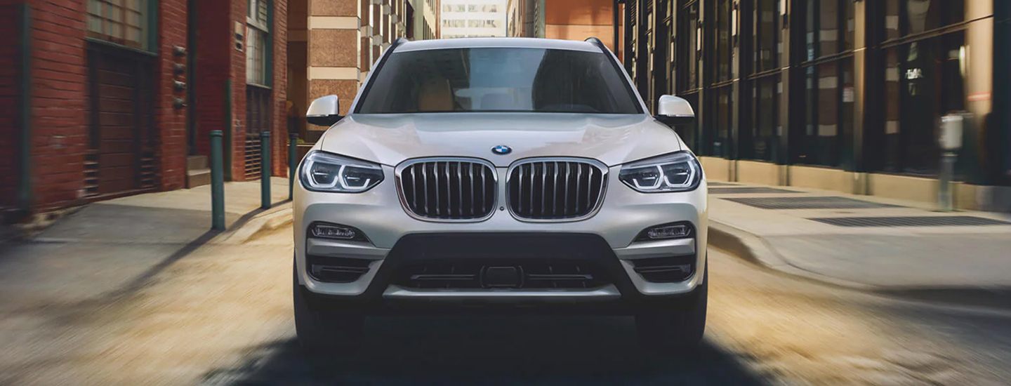 White 2021 BMW X3 in City Alley