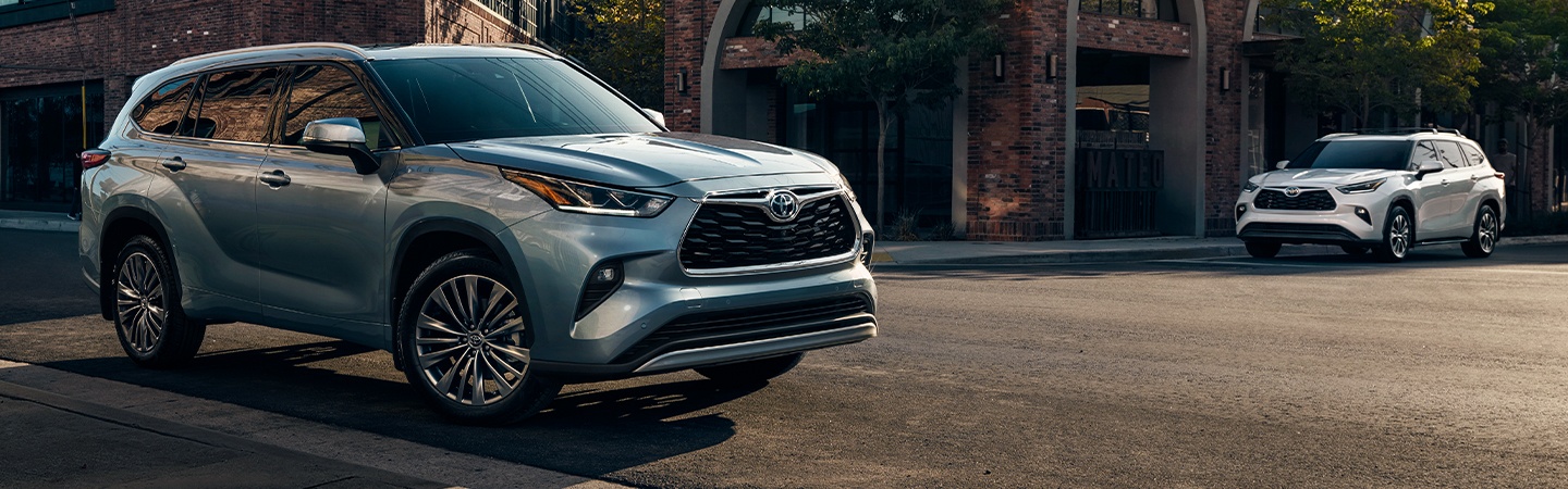 2021 Toyota Highlander is parked on the side of the road
