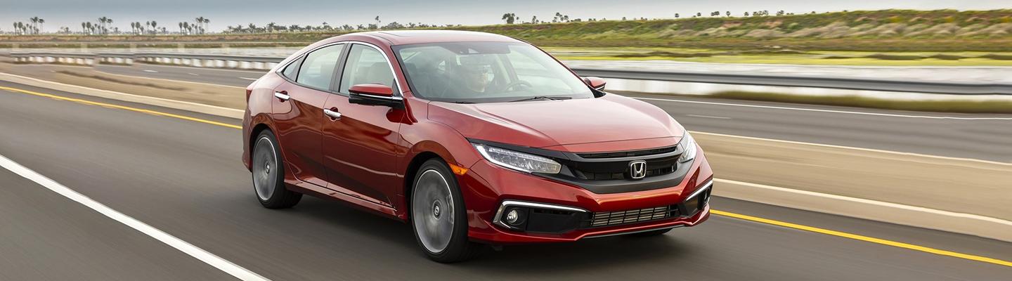 HOnda driving on the road