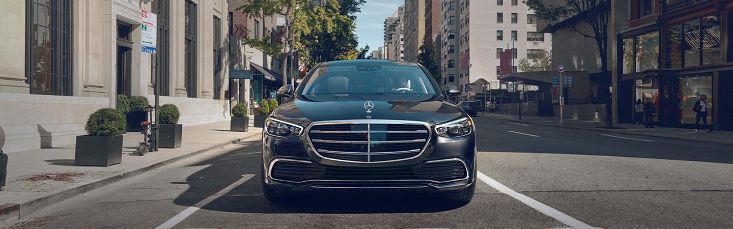 front view of a 2022 Mercedes-Benz S-Class driving in the city