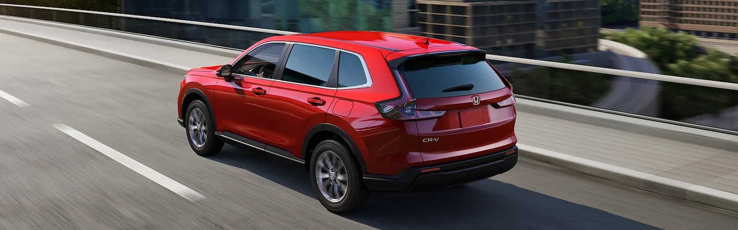 2025 Honda CR-V Hybrid Red color car on road