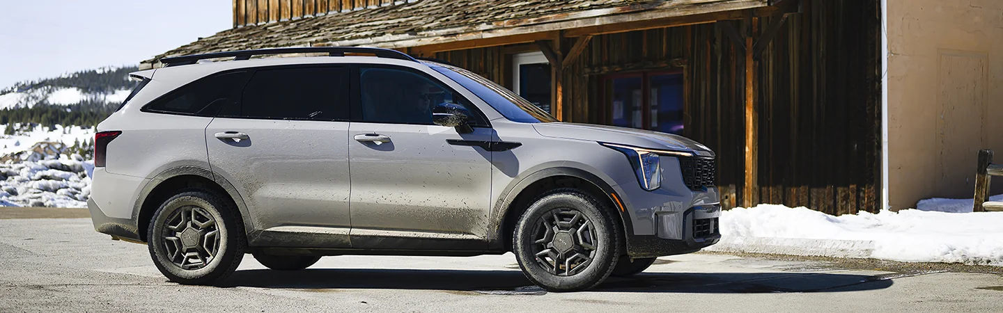 2025 Kia Sorento white color car stand on mountain