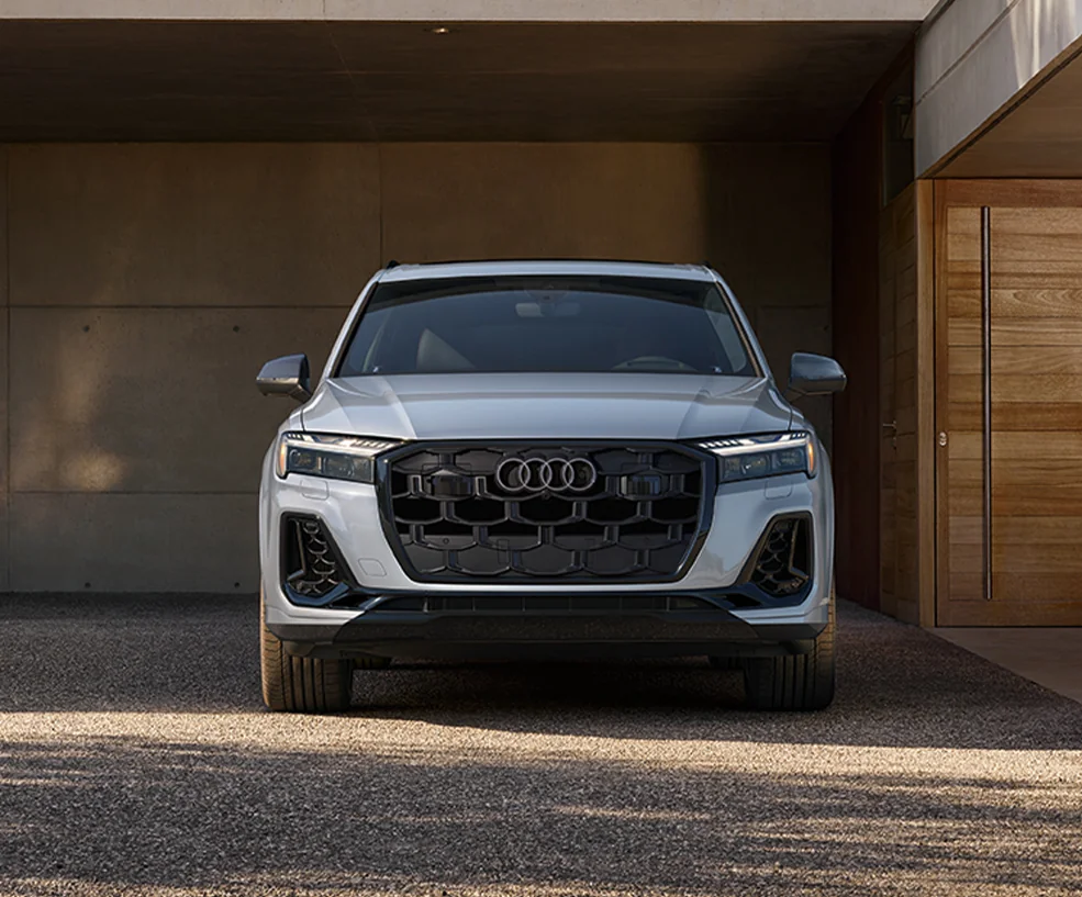 a silver Audi Q7 front view