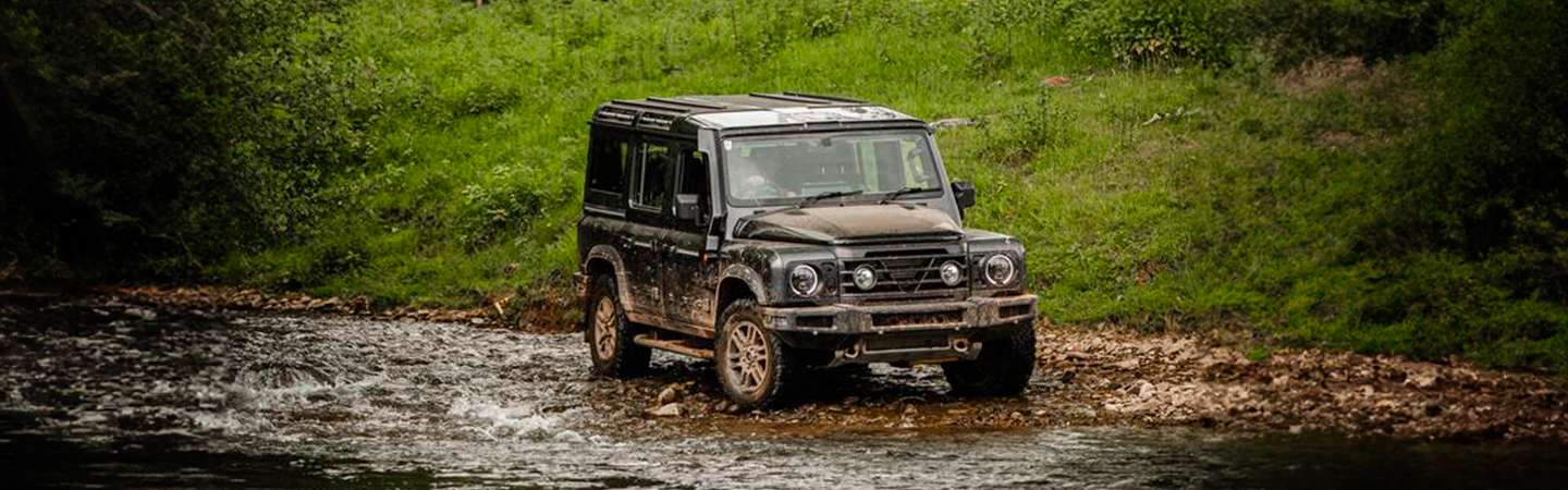 INEOS Grenadier vs Jeep Wrangler blackcolor frontview