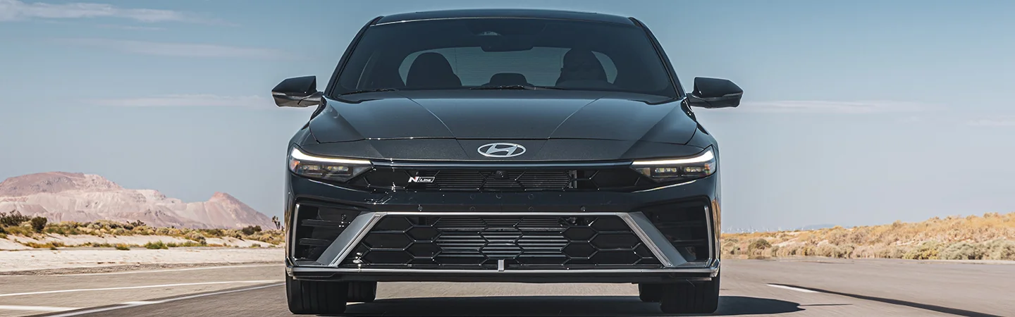 2025 Hyundai Elantra vs Toyota Corolla color black mountain view stand on road