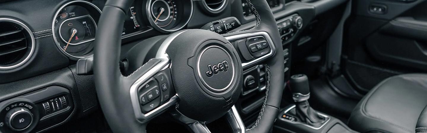 Close-up of the 2021 Jeep Wrangler steering wheel.