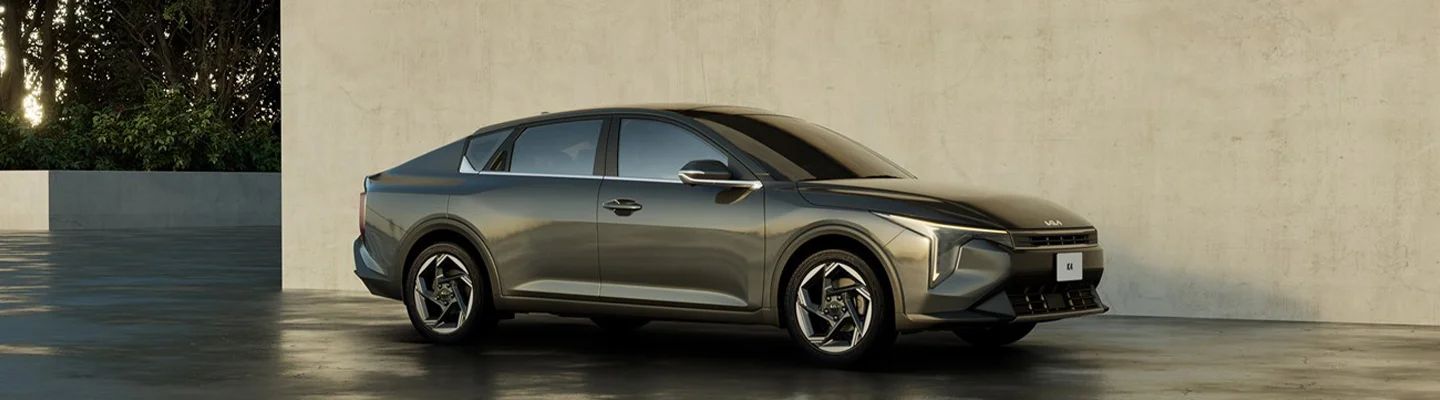 2025 Kia parked in front of a house