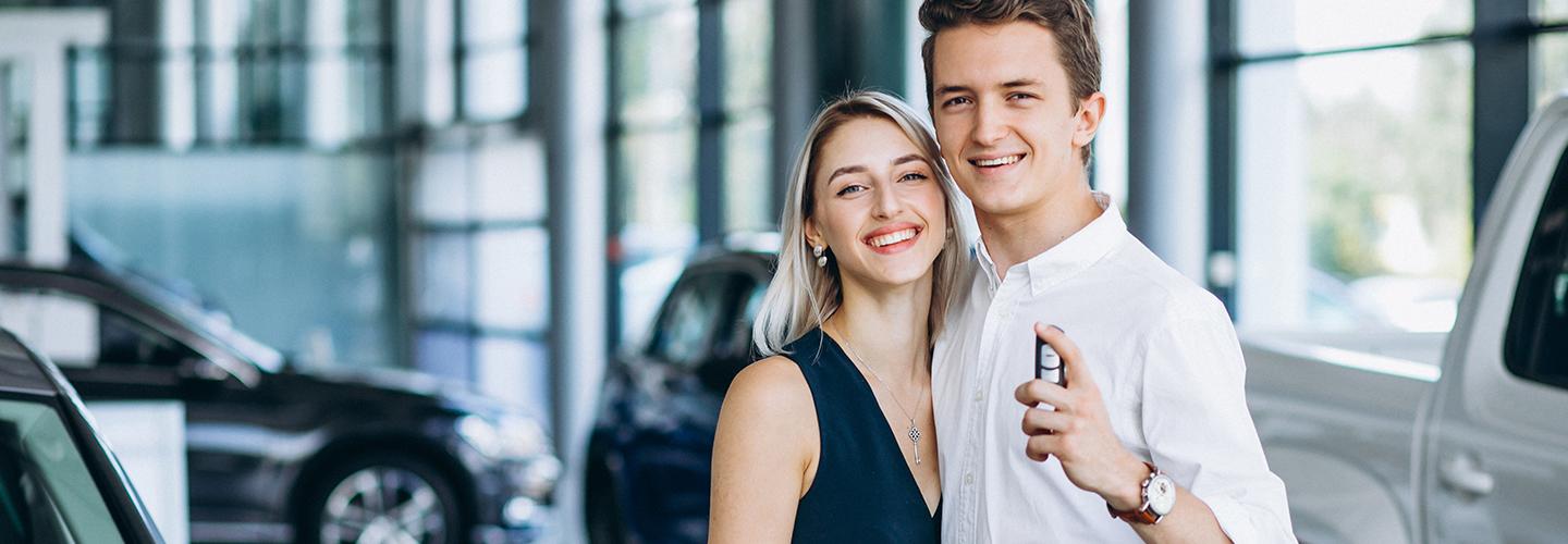 Happy customers with car keys