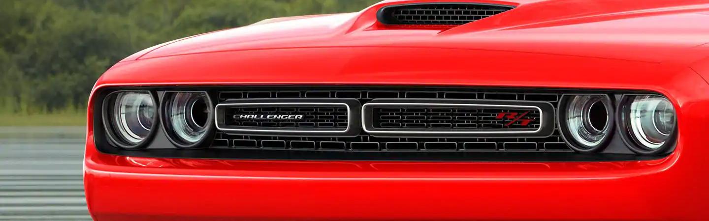 Close up of red Dodge grille