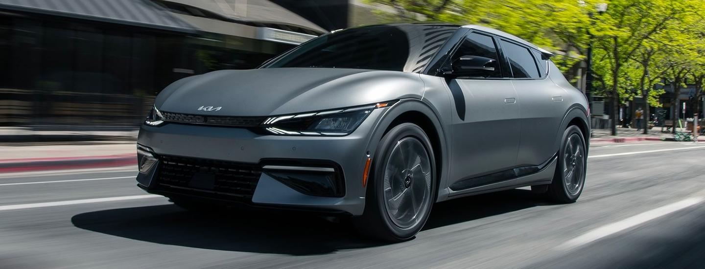 Gray 2022 Kia EV6 driving in the city
