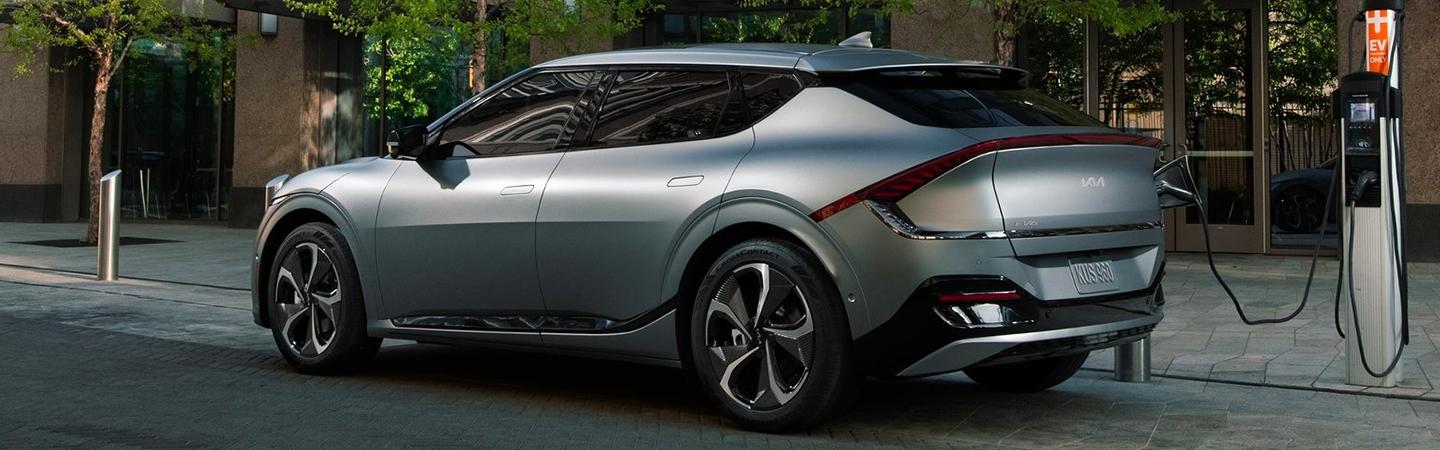 A gray 2022 Kia EV6 parked charging